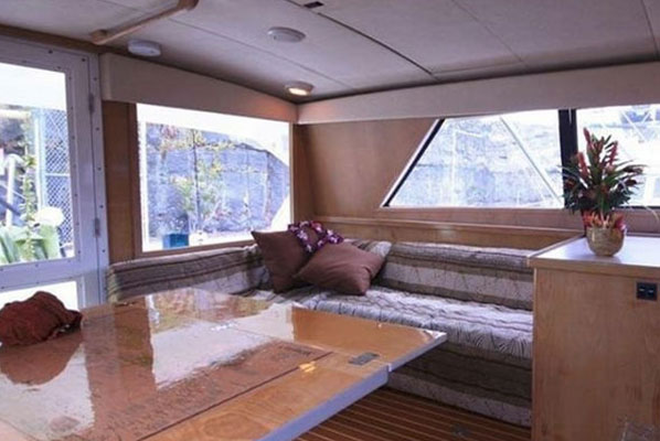 https://tropicalsunsportfishing.com/wp-content/uploads/2024/12/cabin-dining1.jpg